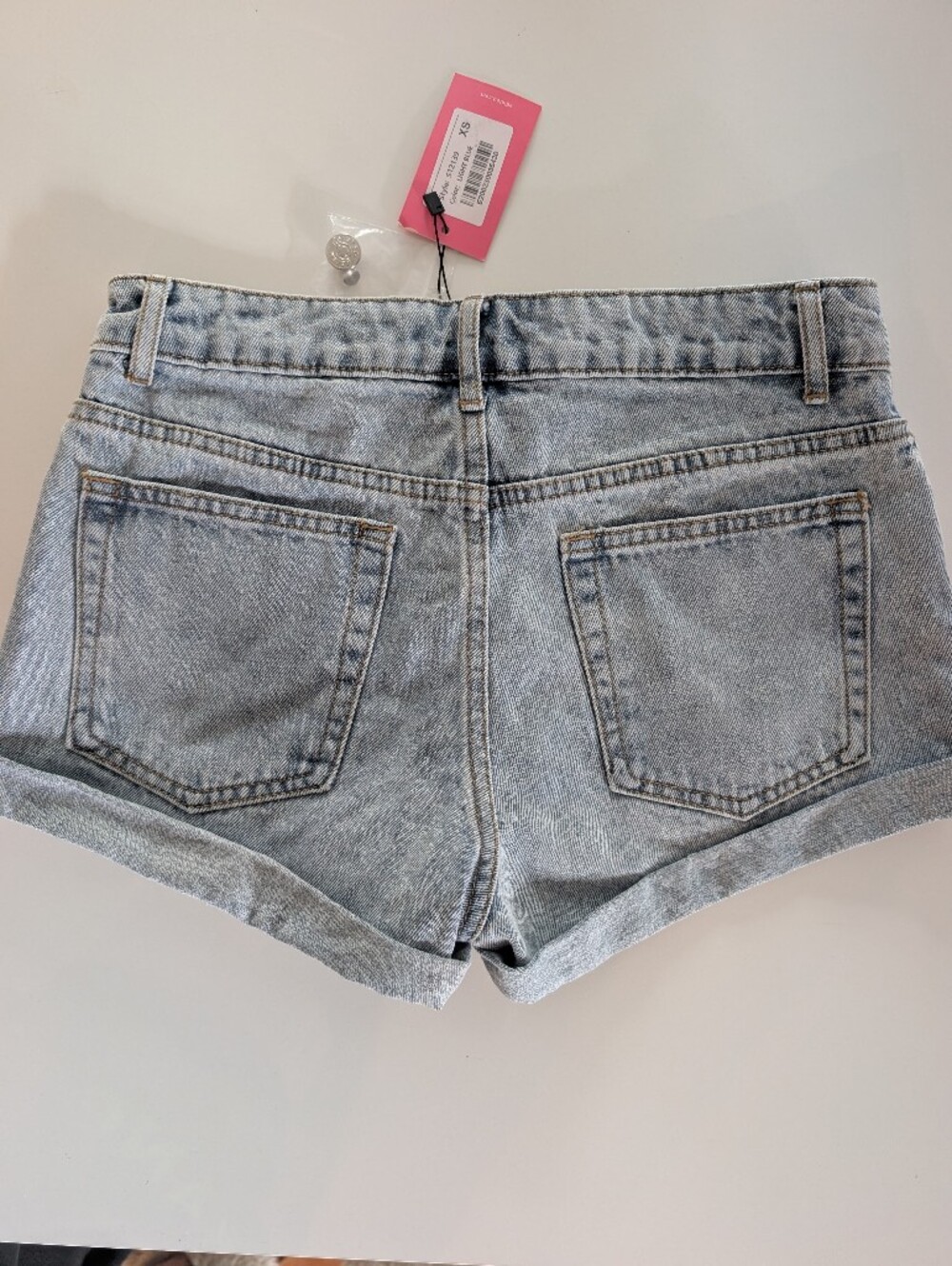 Edikted Low Rise Light Wash Denim Jean Shorts - Picture 7 of 8